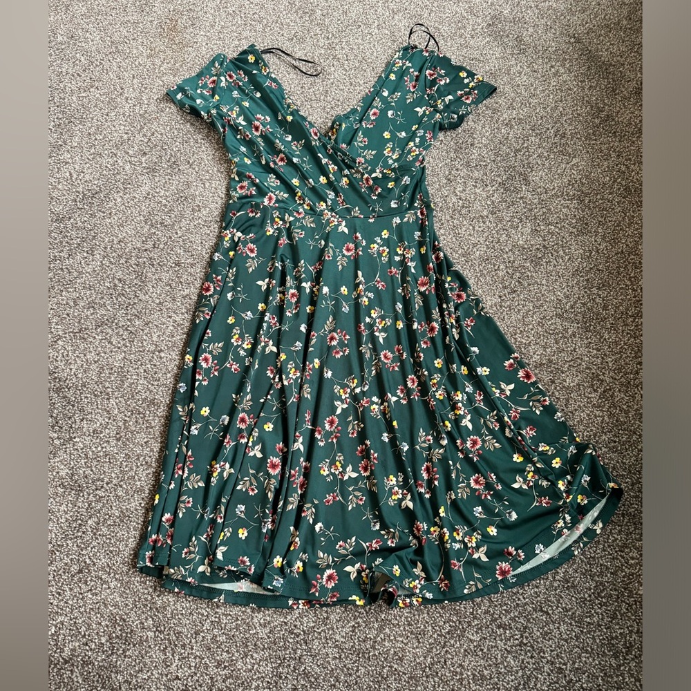 Green silky dress. Comfortable. Size medium.